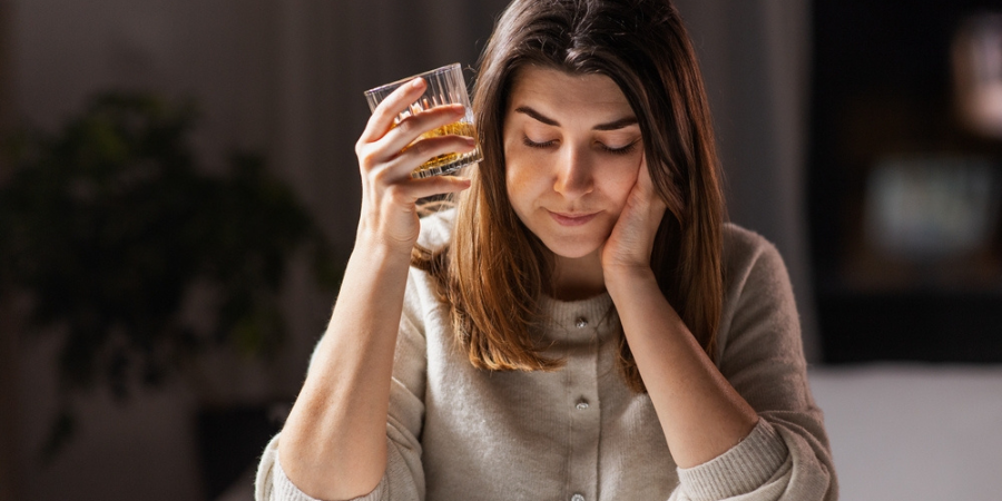 Woman sad after drinking